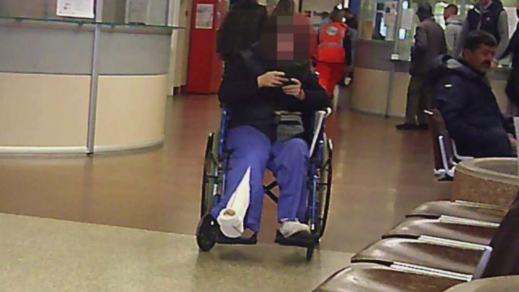 143 - Lady white Slc on wheelchair